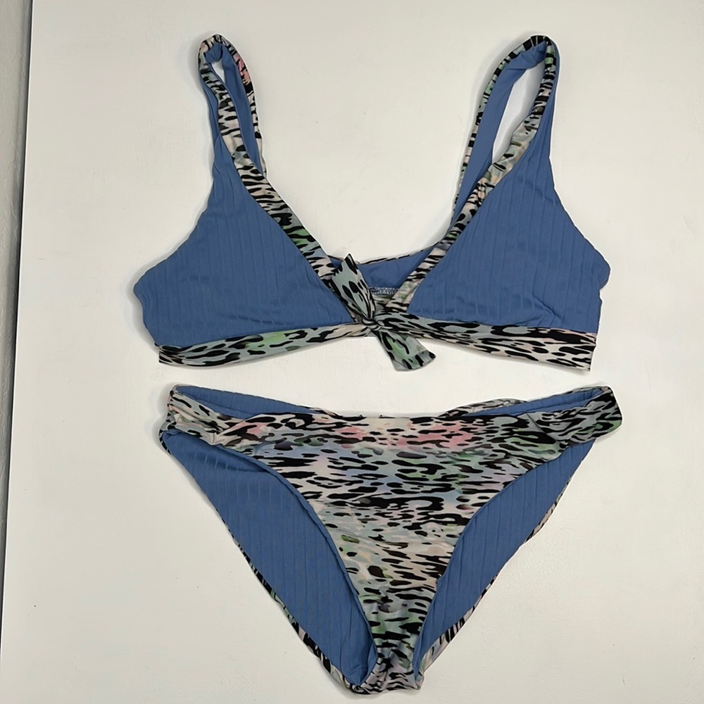 Becca animal instincts blue bikini set size Med/Large reversible
